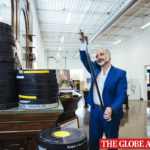 Dominic Sciullo, executive producer of Fellini Forever, looks at a film roll among filmmaker Frederico Fellini's archival material in Toronto, on May 7.Jennifer Roberts/The Globe and Mail