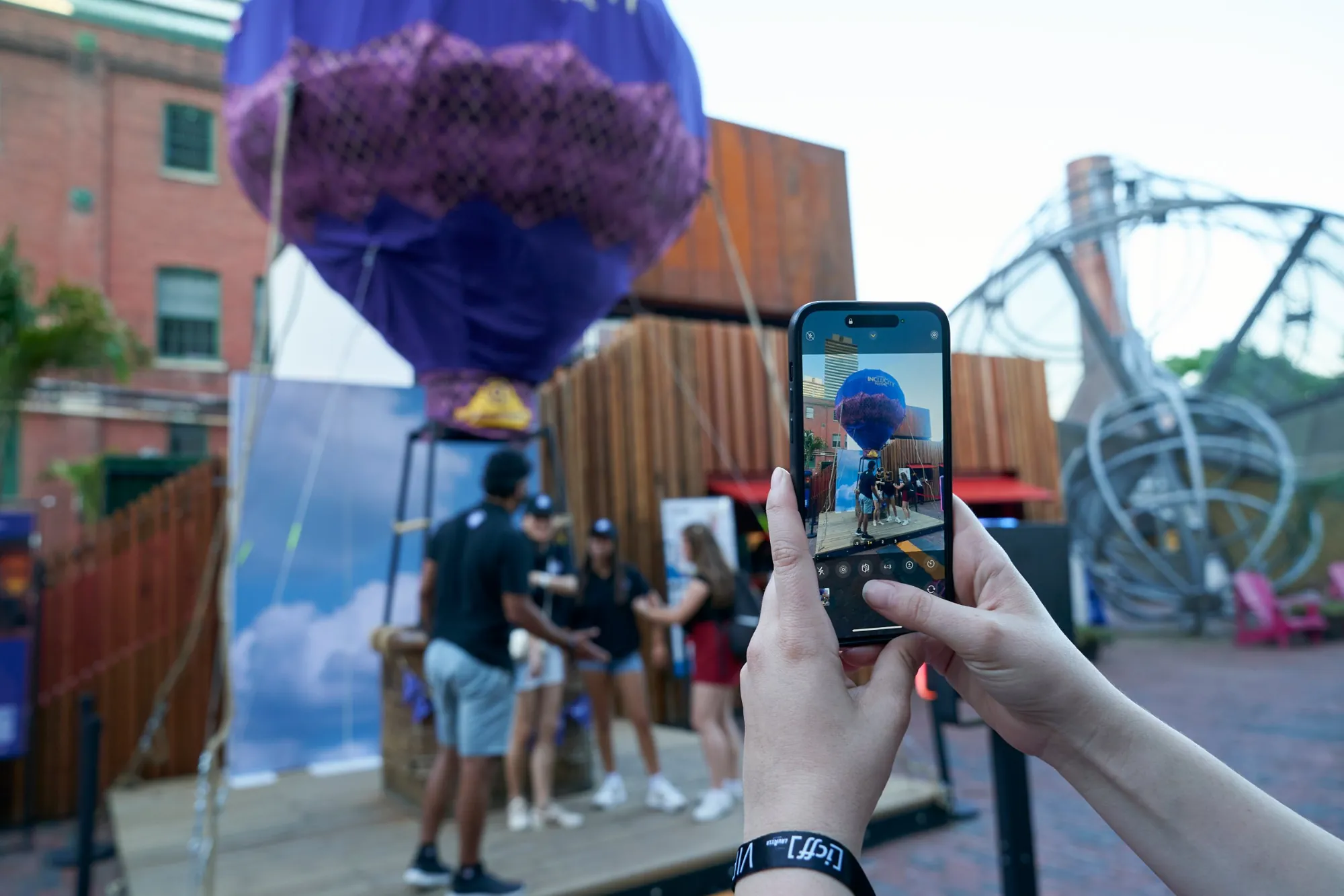 Guests at the G Adventures hot air balloon photo spot at the Lavazza IncluCity Festival