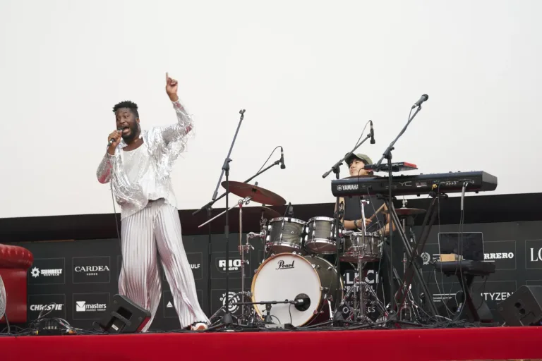Singer in a silver suit