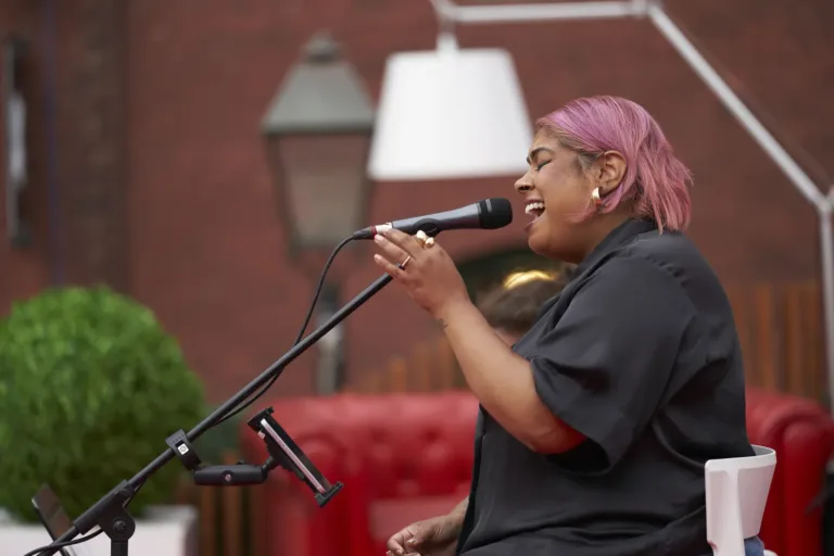 Singer with pink hair