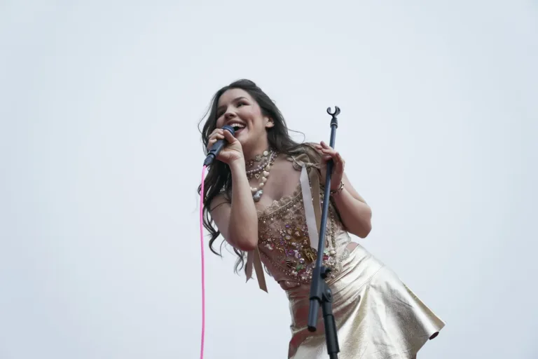 Singer in a gold top