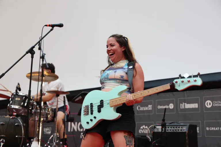 Bassist laughing on stage